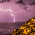 La stagione dei fulmini a Positano e la straordinaria bellezza delle fotografie di Fabio Fusco